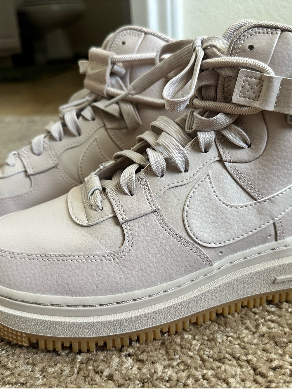 Nike Women’s High-Top Sneakers in Light Rose